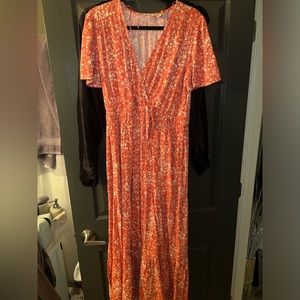 Floral pink dress size medium. Never worn